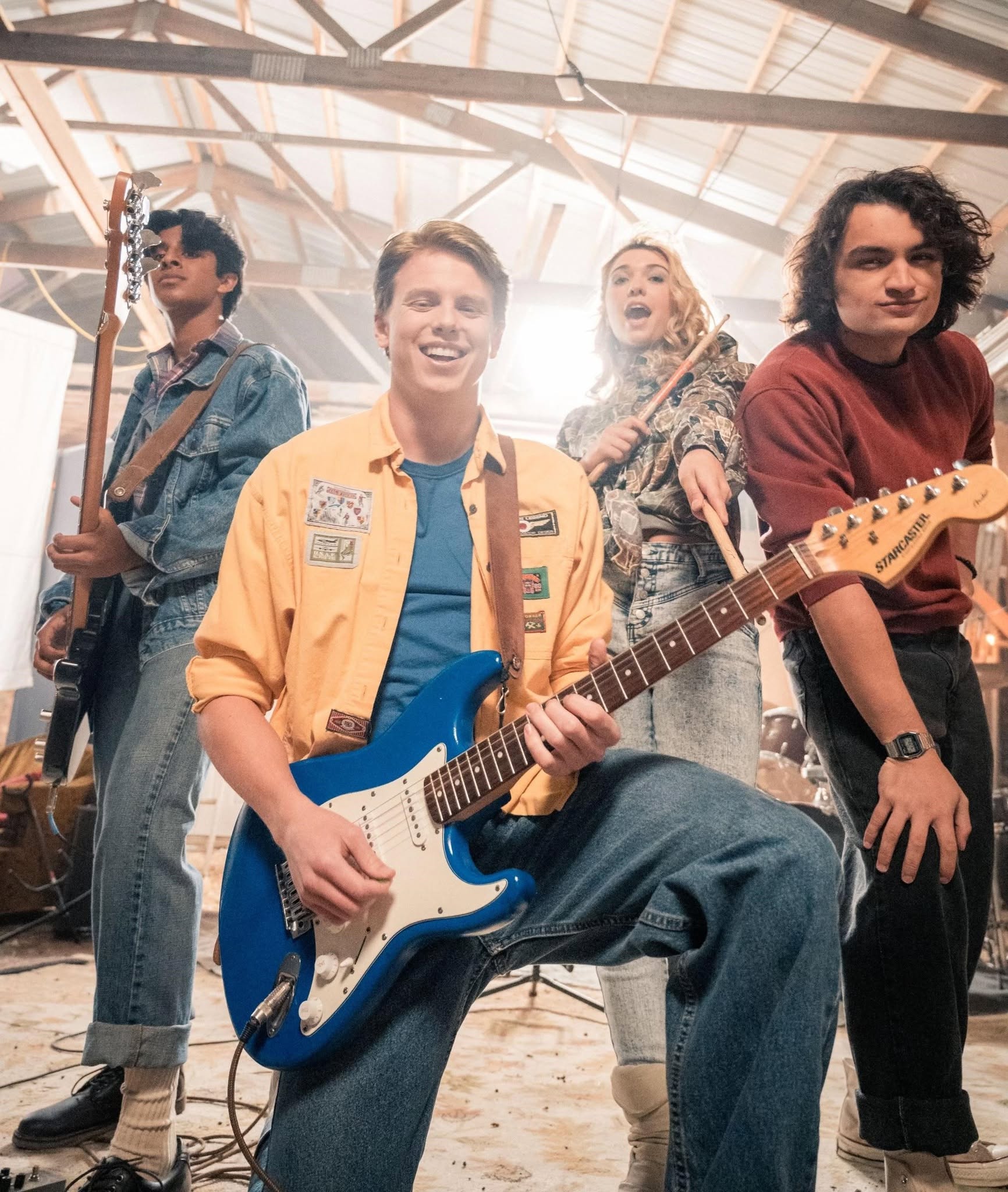 Andy and his band performing in Beyond Belief