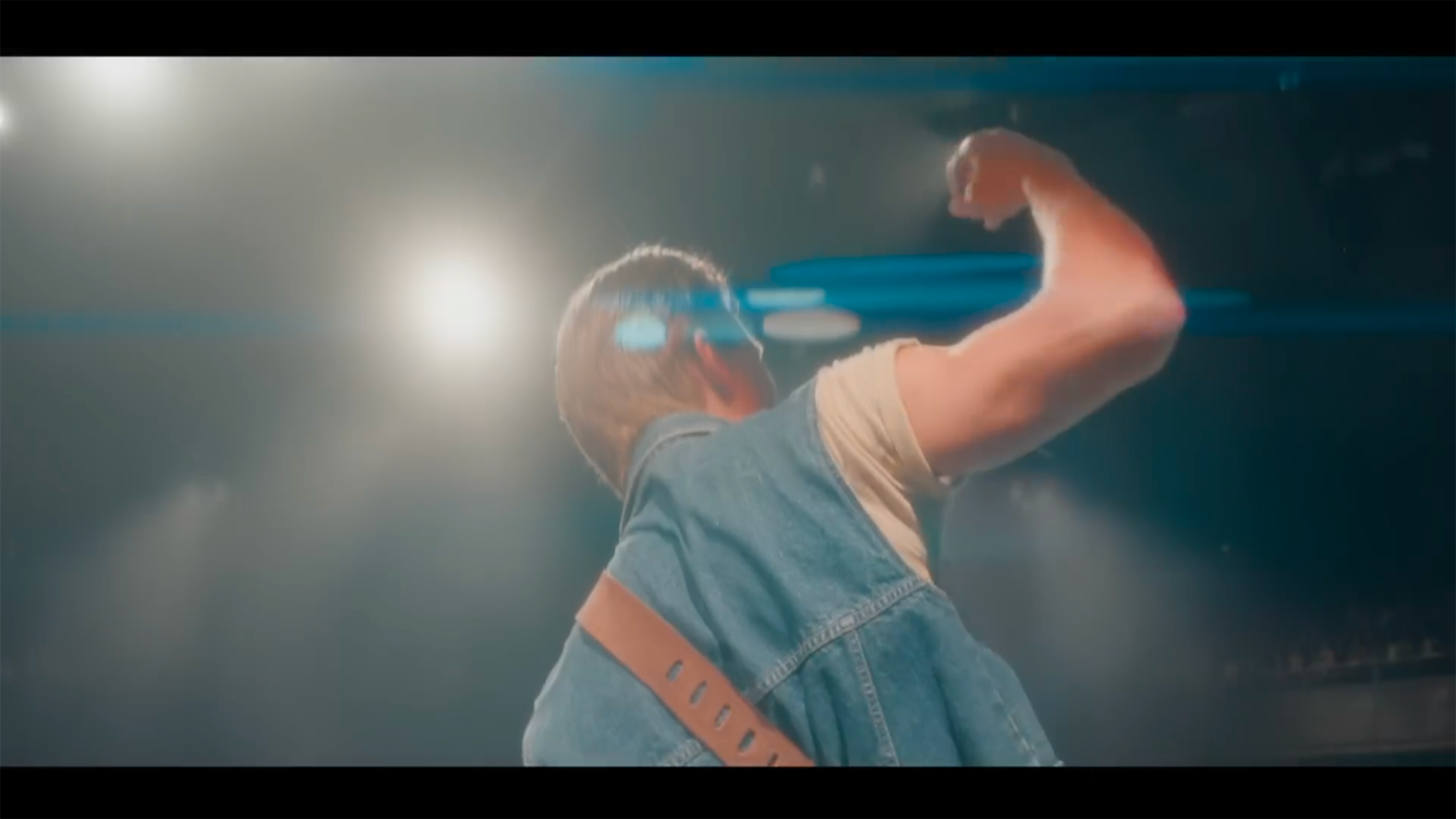 Carson Lueders performing on stage in Beyond Belief